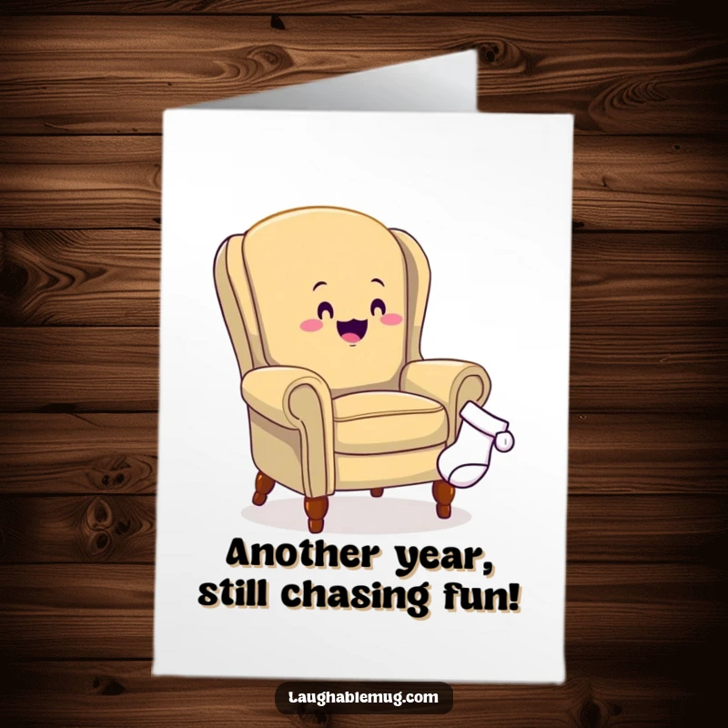 Funny free printable birthday card: A cheerful armchair enthusiastically chases a runaway sock, perfect for a playful birthday wish.