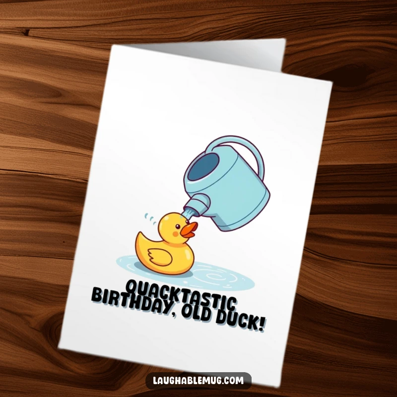 Funny free printable birthday card: A bewildered watering can attempts to water a rubber duck, creating humorous birthday greetings.